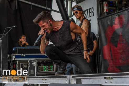 Crown The Empire performing at Vans Warped Tour in Auburn Hills Michigan at The Palace of Auburn Hills on July 18th 2014