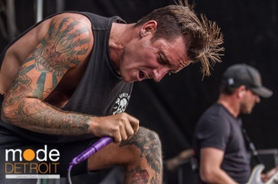 Parkway Drive performing at Vans Warped Tour in Auburn Hills Michigan at The Palace of Auburn Hills on July 18th 2014