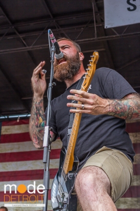 Four Year Strong performing at Vans Warped Tour in Auburn Hills Michigan at The Palace of Auburn Hills on July 18th 2014